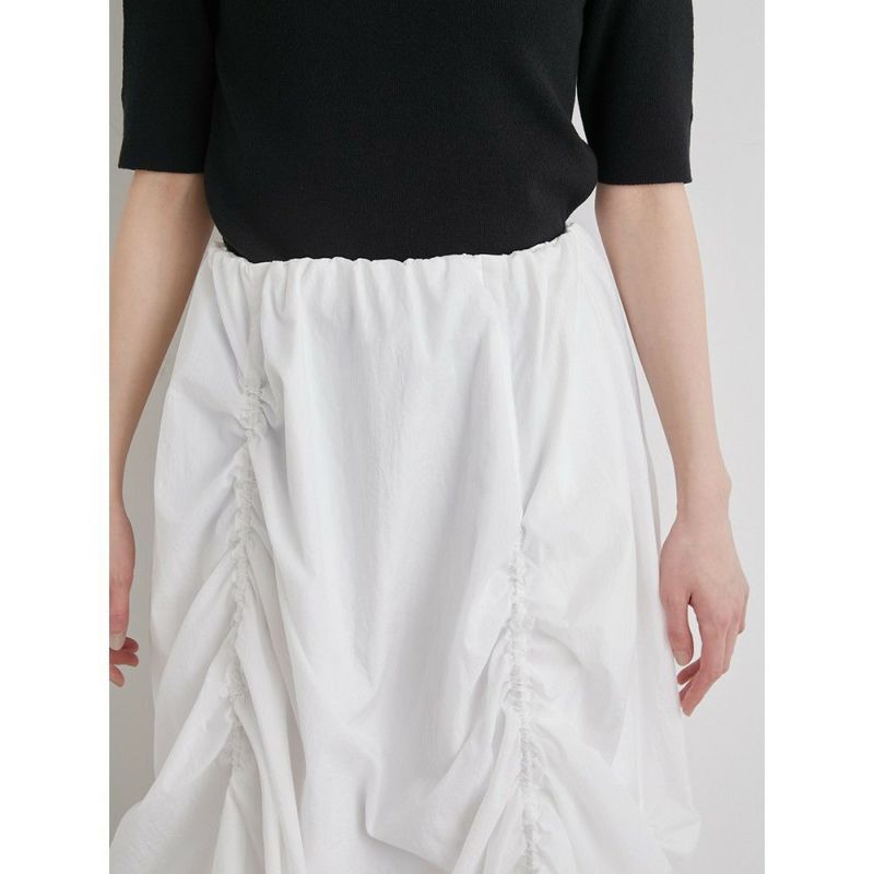 emmi（エミ）撥水変形シャーリングスカート　黒 emmi（エミ）の「【emmi atelier】撥水変形シャーリングスカート